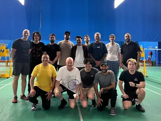 Rapid team playing badminton together