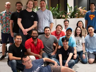 Rapid team members posing together in the office
