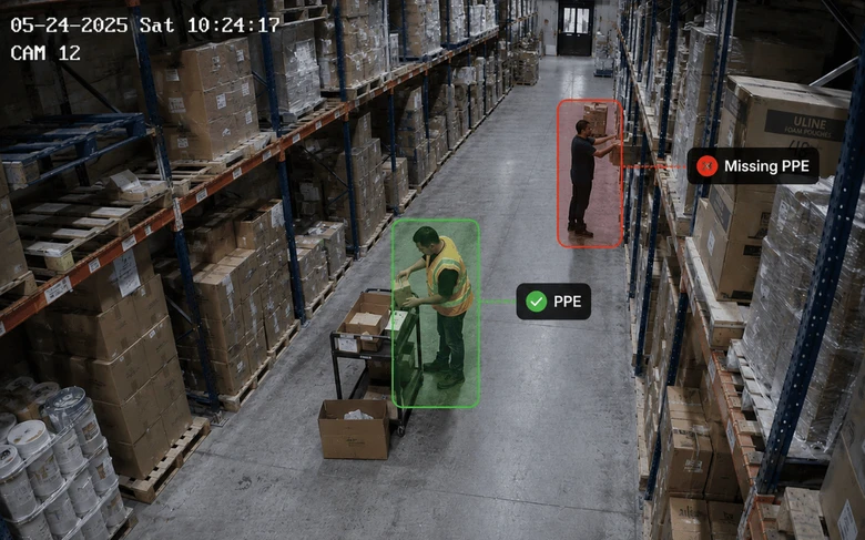 AI safety camera flagging a worker missing hi-vis PPE in a warehouse aisle